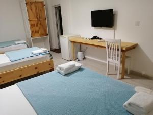Postel nebo postele na pokoji v ubytování merih butik hotel
