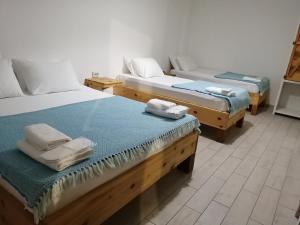 Postel nebo postele na pokoji v ubytování merih butik hotel