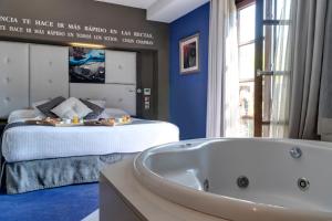Voodi või voodid majutusasutuse Costa Esmeralda Suites toas