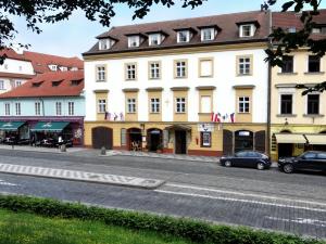 a building on the side of a street at Hotel U Kříže in Prague