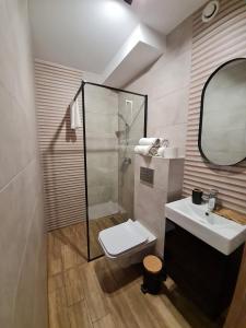 Ένα μπάνιο στο Apartament Łąki18