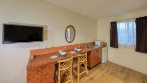 TV a/nebo společenská místnost v ubytování Townview Motel