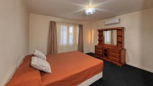 Postel nebo postele na pokoji v ubytování Townview Motel