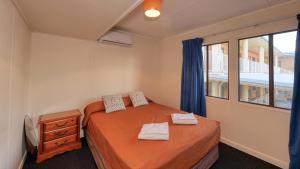 Postel nebo postele na pokoji v ubytování Townview Motel + 37 fotografií
