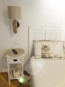 A bed or beds in a room at Affittacamere I Gatti delle 5 Terre