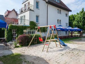 Vaikų žaidimų erdvė apgyvendinimo įstaigoje Dom Gościnny Sand