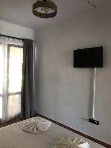 A television and/or entertainment centre at Villa Oasis етаж1