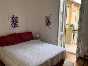 Кровать или кровати в номере Il salottino