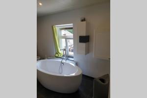 Koupelna v ubytování Maison située à 1km du circuit de Francorchamps + 11 fotografií