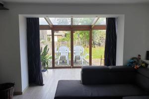 Posezení v ubytování Maison située à 1km du circuit de Francorchamps