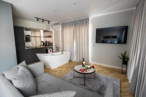Posezení v ubytování Студио с вана и гледка в "The House" с Термална зона