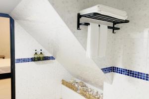 Koupelna v ubytování SNUG·NINE Hotel