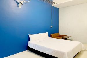 Voodi või voodid majutusasutuse SNUG·NINE Hotel toas