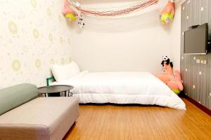 Voodi või voodid majutusasutuse SNUG·NINE Hotel toas