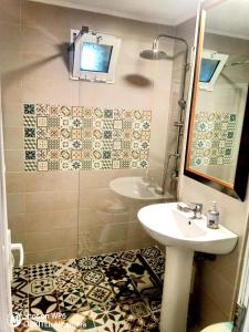 Kúpeľňa v ubytovaní Apartament Dor de Delta Sulina