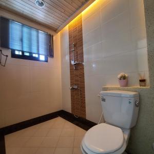 Vannituba majutusasutuses Dibao 16 Homestay