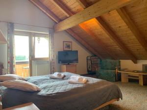 Postel nebo postele na pokoji v ubytování Gasthof Sonnenheim
