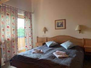 Postel nebo postele na pokoji v ubytování Gasthof Sonnenheim