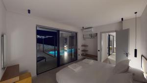 Posteľ alebo postele v izbe v ubytovaní DAELIA Villas + 23 fotografií