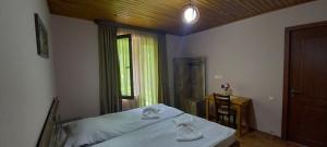 Letto o letti in una camera di Lisaneli
