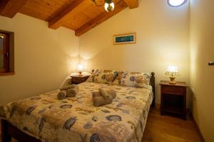 Voodi või voodid majutusasutuse Villa Flaveico toas