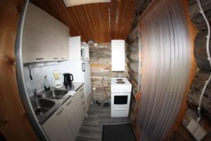 Η κουζίνα ή μικρή κουζίνα στο Tenon näköalamökit