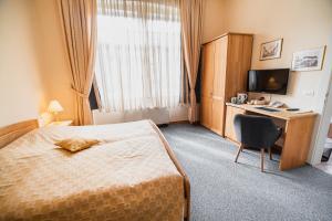 Postel nebo postele na pokoji v ubytování Guest House Veronika