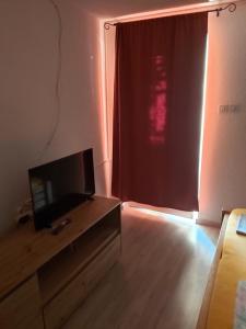 TV a/nebo společenská místnost v ubytování Soba Janja