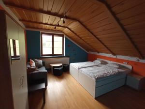 Postel nebo postele na pokoji v ubytování Vila Bělá pod Pradědem