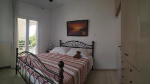 A bed or beds in a room at Emily`s vacation house