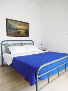 A bed or beds in a room at Emily`s vacation house