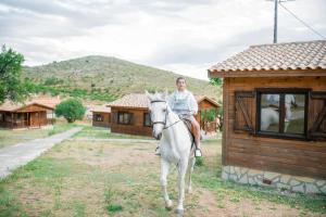 Montar a caballo en the country house o alrededores