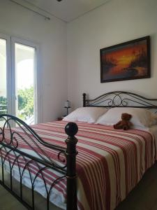 A bed or beds in a room at Emily`s vacation house