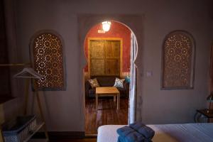 Postel nebo postele na pokoji v ubytování DOMUS AMABILIS - ESPAI GAETA