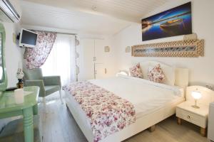 Ένα ή περισσότερα κρεβάτια σε δωμάτιο στο Lodos Butik Hotel