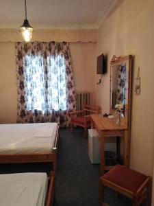 Postel nebo postele na pokoji v ubytování Hotel Faraggi