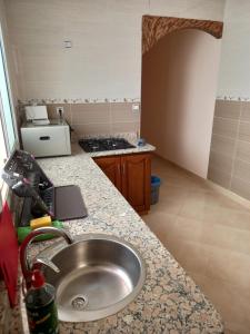 Kuchyň nebo kuchyňský kout v ubytování Nieuwbouw appartementen al hoceima