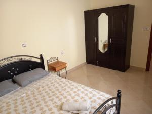 Postel nebo postele na pokoji v ubytování Nieuwbouw appartementen al hoceima