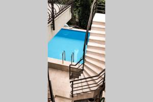 a stairway leading up to a swimming pool at RESIDENTIAL HOUSE in Sarajevo