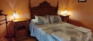 Hotel Rural el Arrabal Siguenza客房内的一张或多张床位