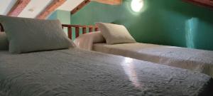 Hotel Rural el Arrabal Siguenza客房内的一张或多张床位