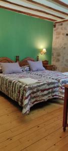 Hotel Rural el Arrabal Siguenza客房内的一张或多张床位