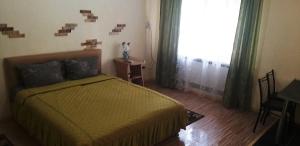 Postel nebo postele na pokoji v ubytování Apartments