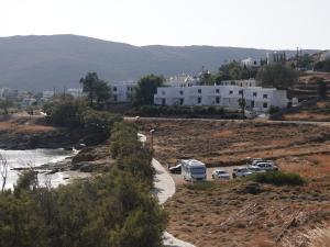a group of vehicles parked in a parking lot at EL.DO.SO in Gavrio +21 photos