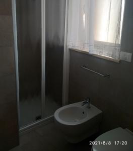 Koupelna v ubytování Primae Noctis Apartments