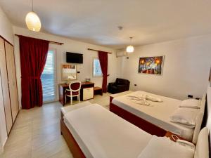 Postel nebo postele na pokoji v ubytování Vila Ada Hotel + 37 fotografií
