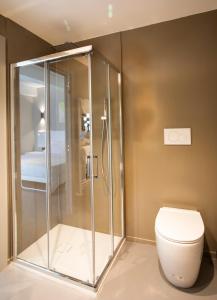 a bathroom with a shower and a toilet at Country House La Cipolla D'oro in Potenza Picena