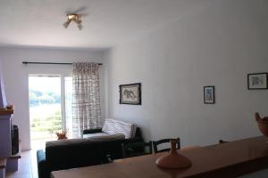 Postel nebo postele na pokoji v ubytování Kolios Seaside Apartments
