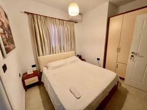Postel nebo postele na pokoji v ubytování Vila Ada Hotel
