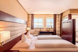 Postel nebo postele na pokoji v ubytování Akzent Hotel Löwen